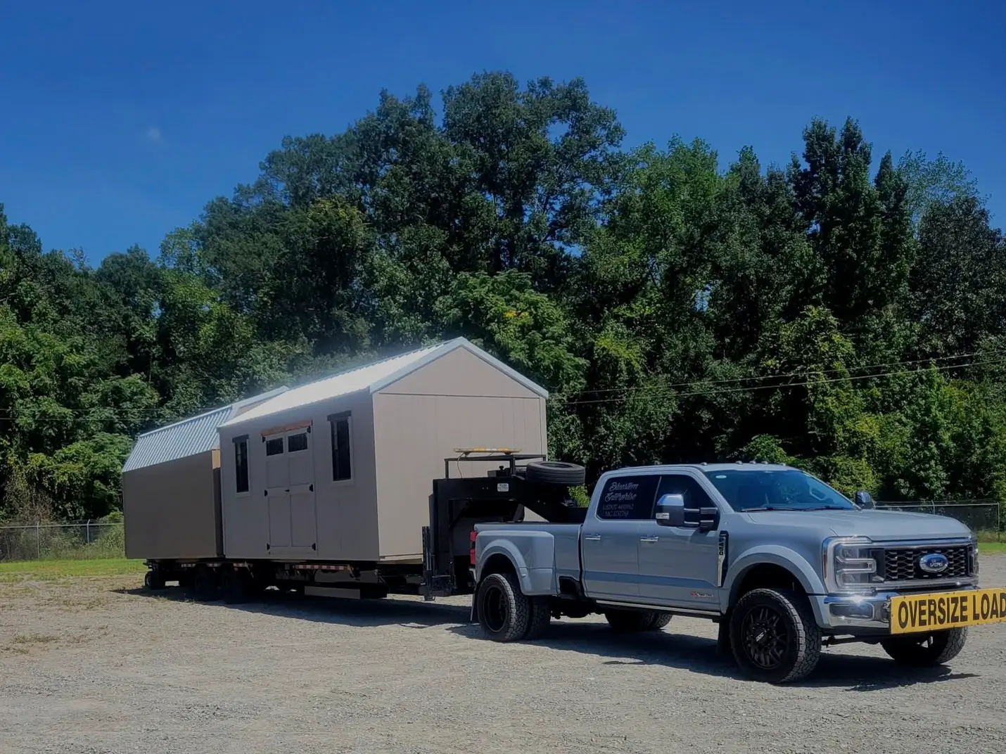 Silverwood truck transporting a portable building on a delivery trailer